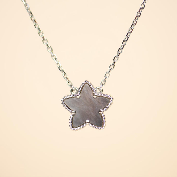 Second Hand Van Cleef & Arpels Lucky Star Pendant Grey Mother of Pearl 18K White Gold