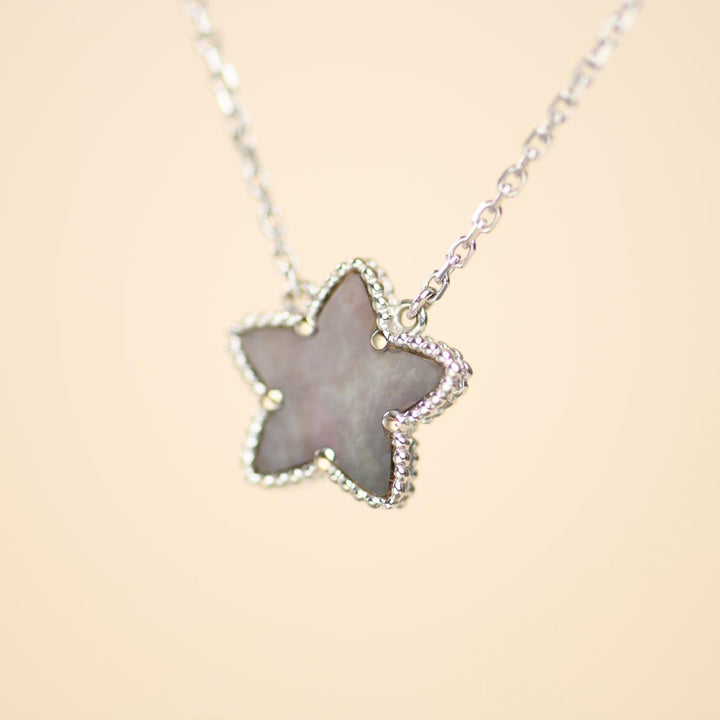 Preowned Authentic Van Cleef Lucky Star Pendant Grey Mother of Pearl 18K White Gold