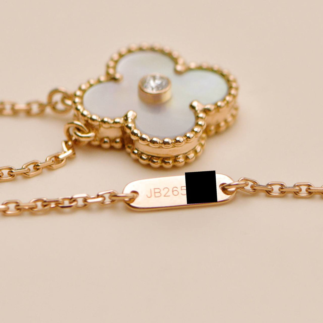 Second hand Authentic Van Cleef Alhambra 2012 Holiday Necklace Diamond Mother of Pearl