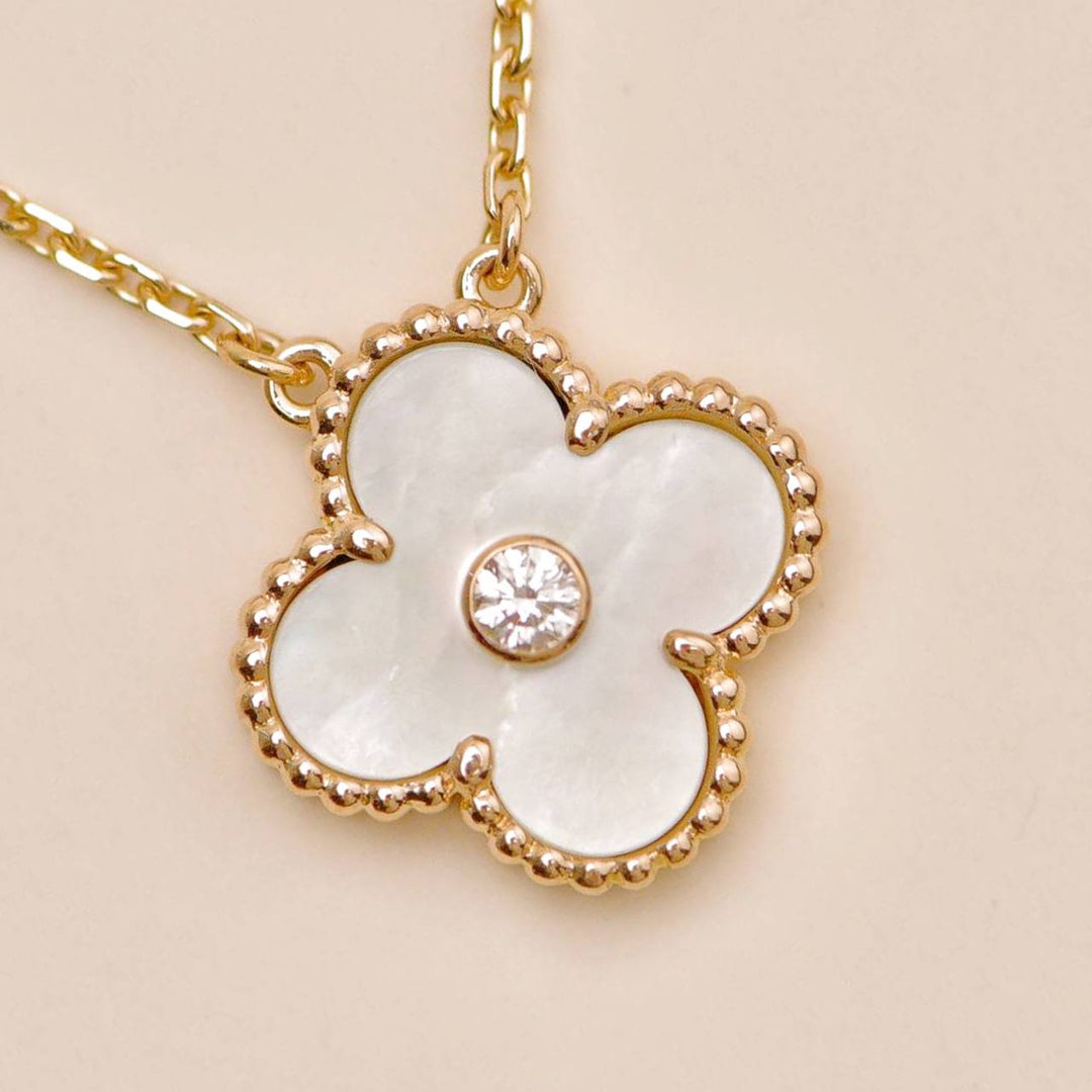 Authentic Van Cleef & Arpels Alhambra 2012 Holiday Necklace Diamond Mother of Pearl