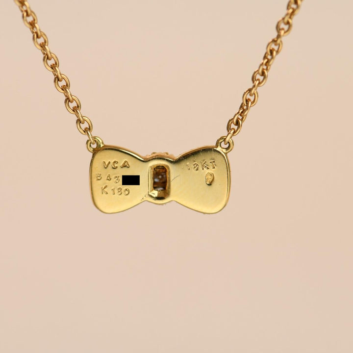 Authentic Second Hand Van Cleef & Arpels Coral & Diamond Bow Pendant Necklace 18K Yellow Gold