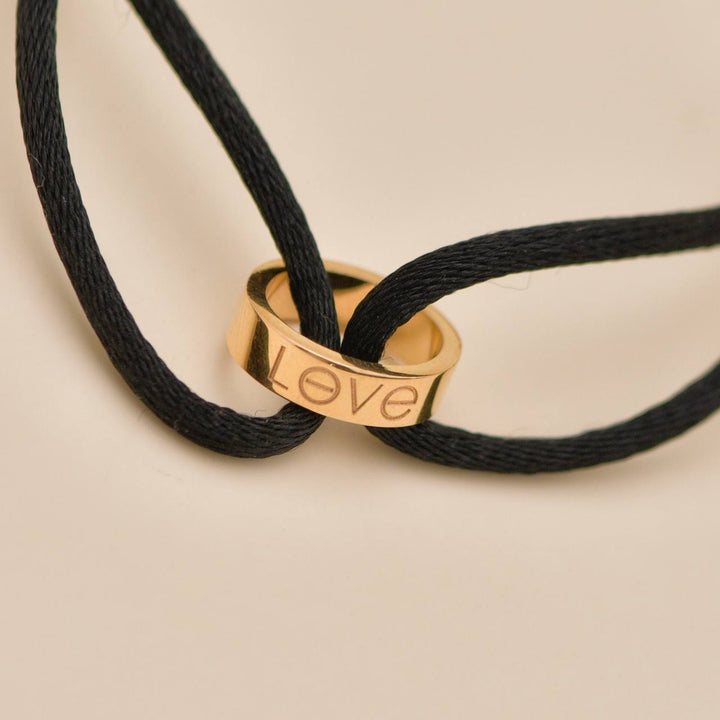 Preowned Cartier Love Cord Bracelet 18K Rose Gold on Black Silk