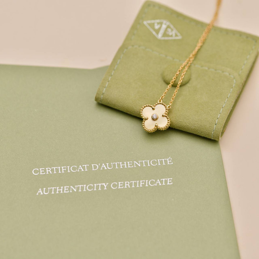 Preowned Authentic Van Cleef & Arpels Alhambra 2018 Holiday Pendant Golden Mother of Pearl Diamond