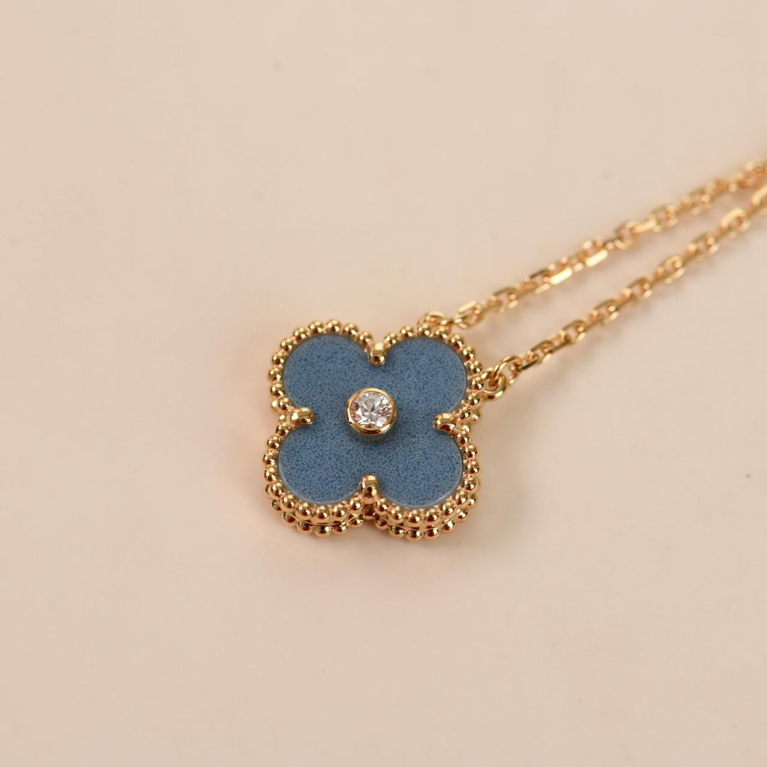 2026 VCA Holiday blue grey Sèvres porcelain pendant displayed with original branded packaging