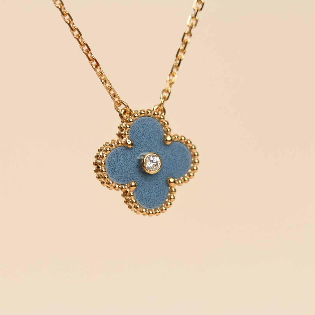 2026 VCA Holiday blue grey Sèvres porcelain pendant displayed with original branded packaging