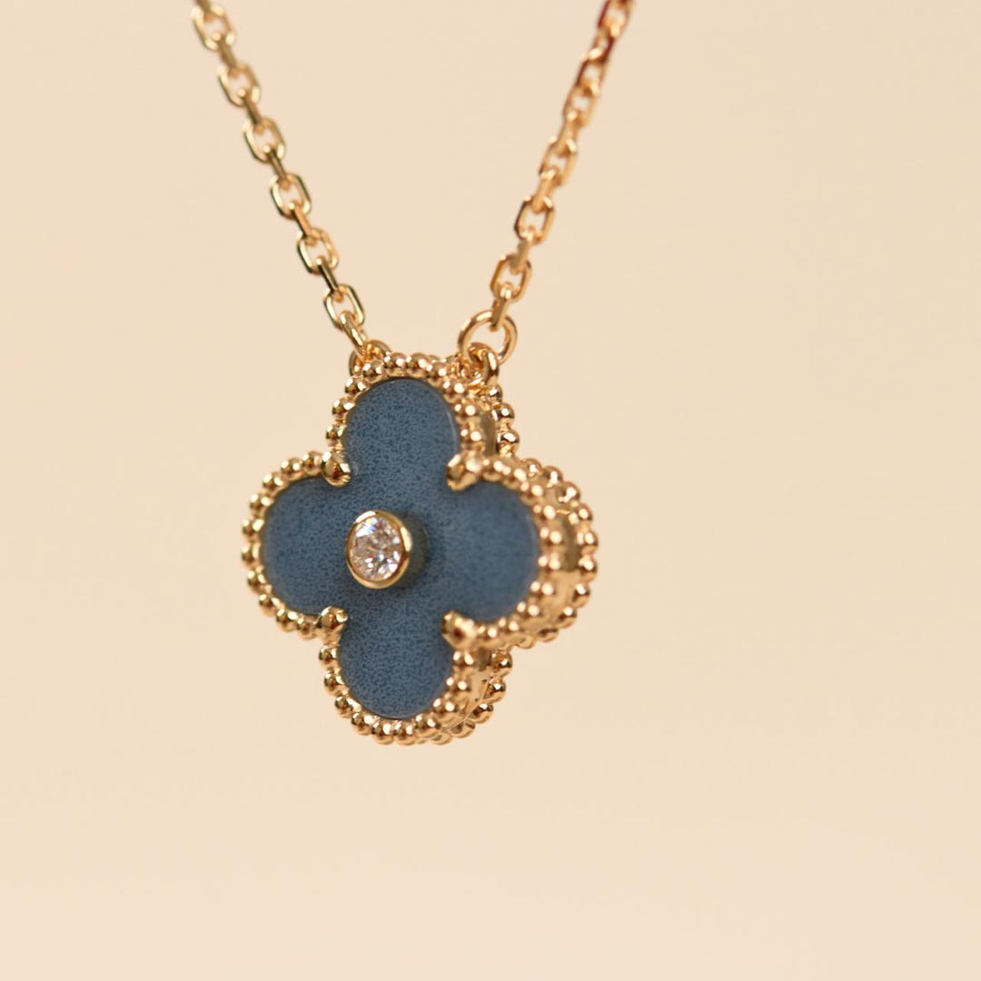 2026 VCA Holiday blue grey Sèvres porcelain pendant displayed with original branded packaging