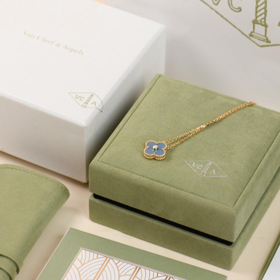 Original Van Cleef & Arpels green jewellery box, travel pouch and packaging for 2026 Holiday pendant