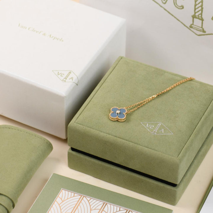 Original Van Cleef & Arpels green jewellery box, travel pouch and packaging for 2026 Holiday pendant