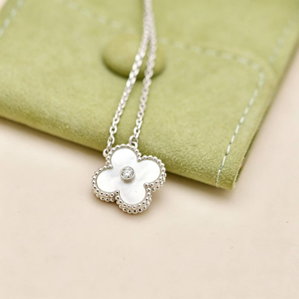 Preowned Authentic Van Cleef & Arpels Alhambra 2009 Holiday Pendant Mother of Pearl