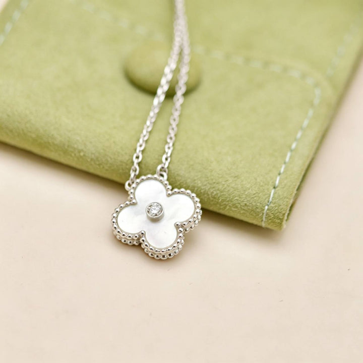 Preowned Authentic Van Cleef & Arpels Alhambra 2009 Holiday Pendant Mother of Pearl