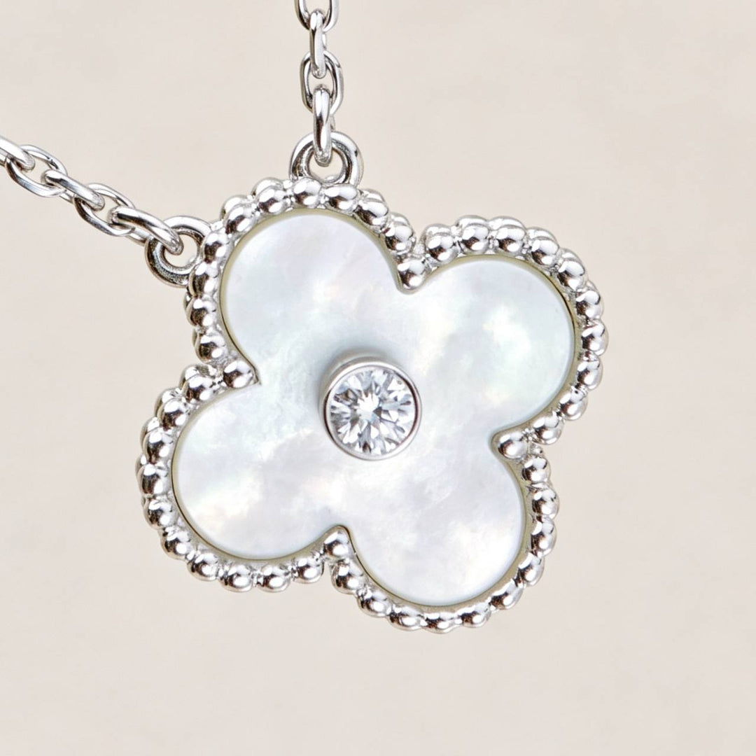 Preloved Authentic Van Cleef Alhambra 2009 Holiday Pendant Mother of Pearl