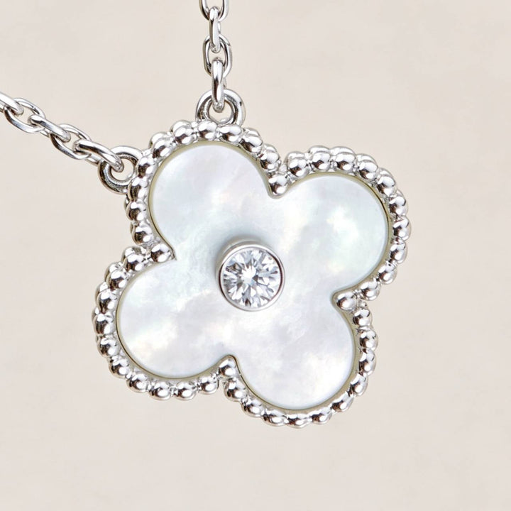 Preloved Authentic Van Cleef Alhambra 2009 Holiday Pendant Mother of Pearl