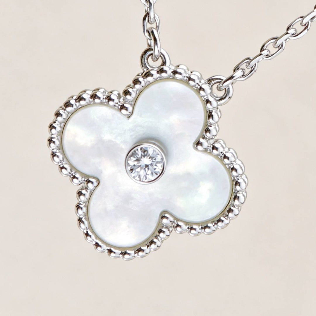 Preowned Authentic Van Cleef Alhambra 2009 Holiday Pendant Mother of Pearl