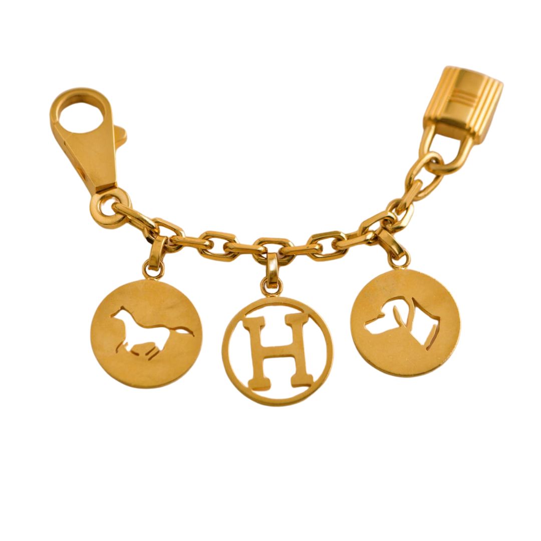 Hermès Gold plated Breloque Olga Bag Charm Amulette – Dandelion