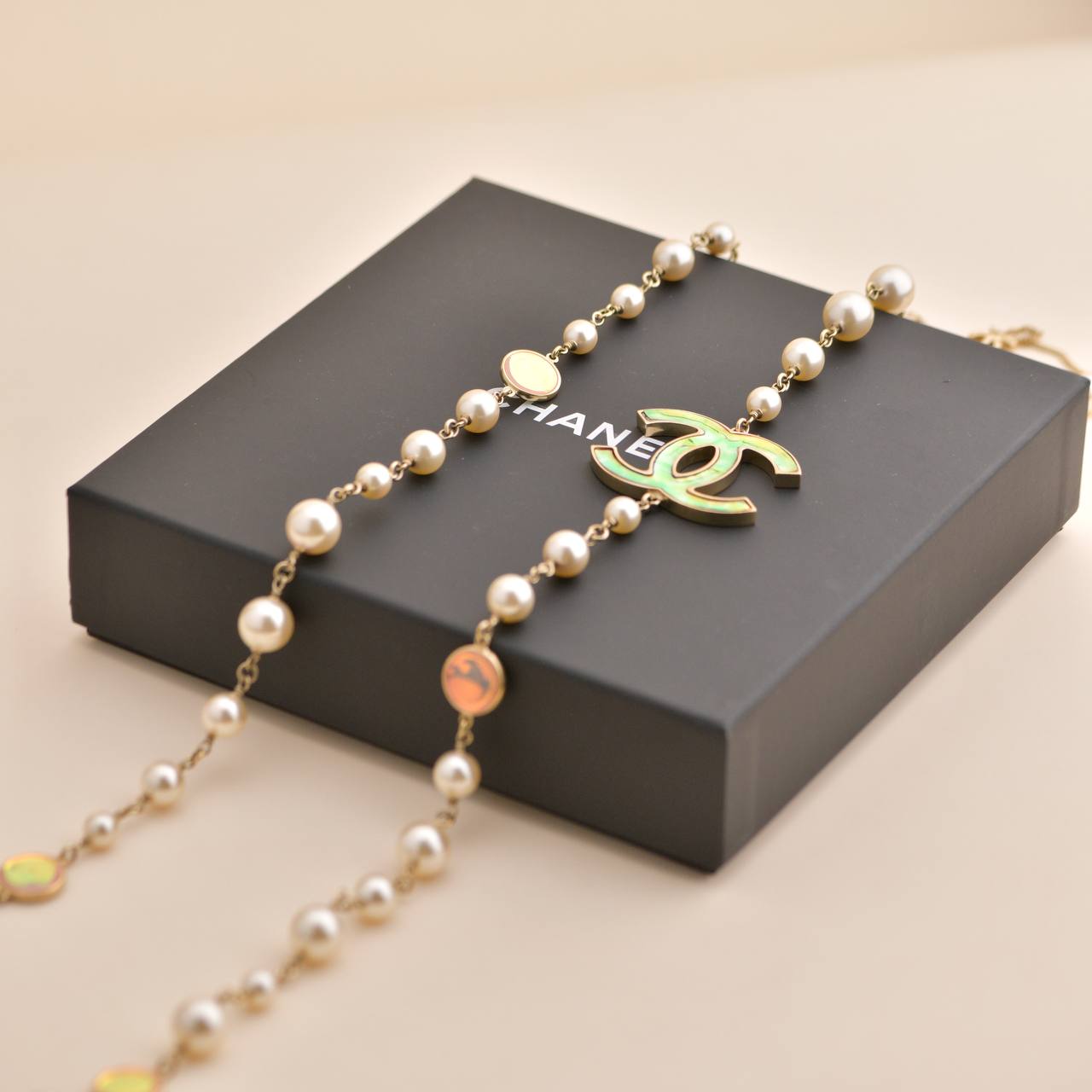 Chanel long discount pearl necklace