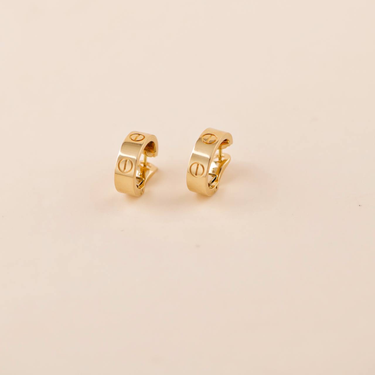 Cartier love best sale earrings yellow gold