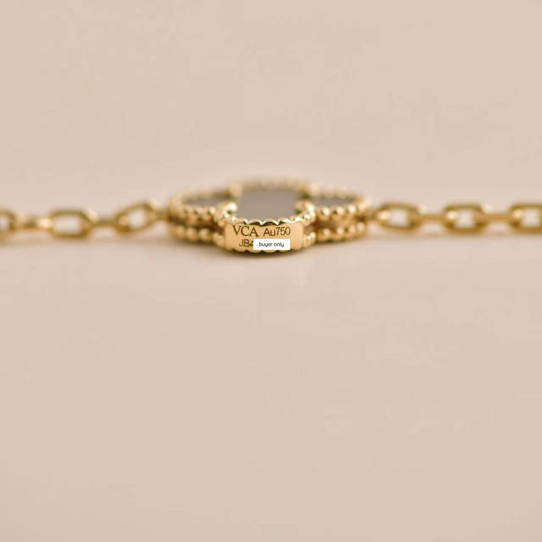 Van Cleef & Arpels Onyx Yellow Gold Bracelet