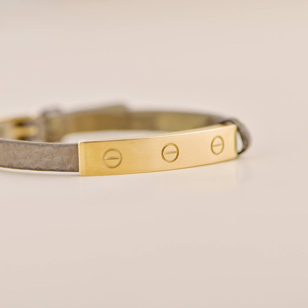 Pre-loved Cartier Love 18k Yellow Gold Slide Bar Leather Bracelet