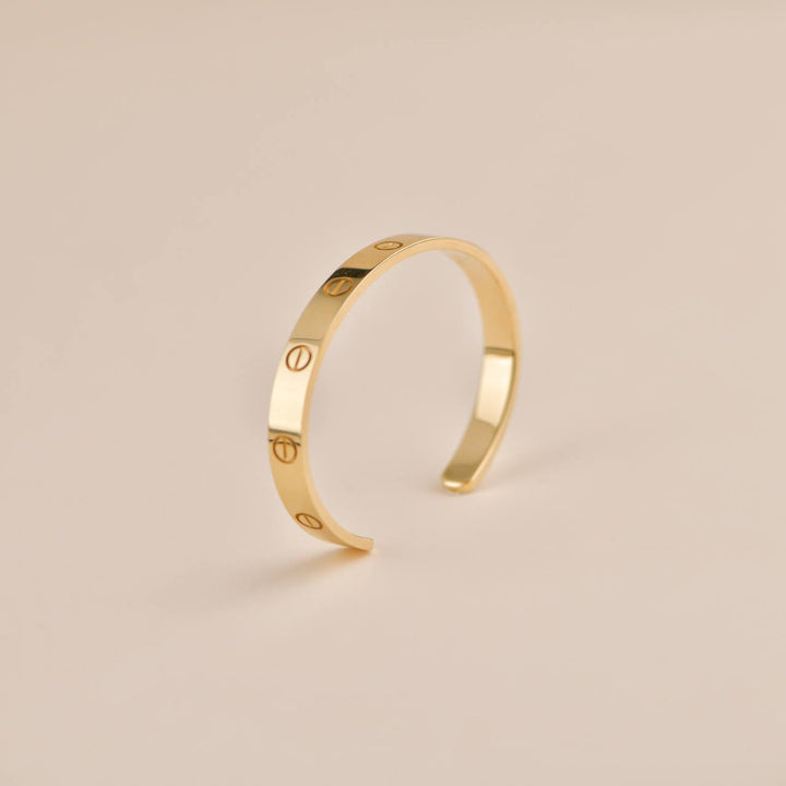 preowned cartier yellow gold love bangle bracelet 