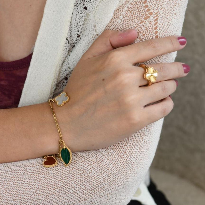 Second Hand Van Cleef & Arpels Lucky Alhambra 4 Motifs 18K Yellow Gold Bracelet
