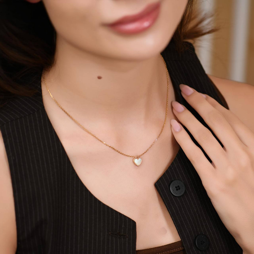 Preloved Van Cleef & Arpels Sweet Alhambra Heart Mother of Pearl 18K Yellow Gold Pendant Necklace