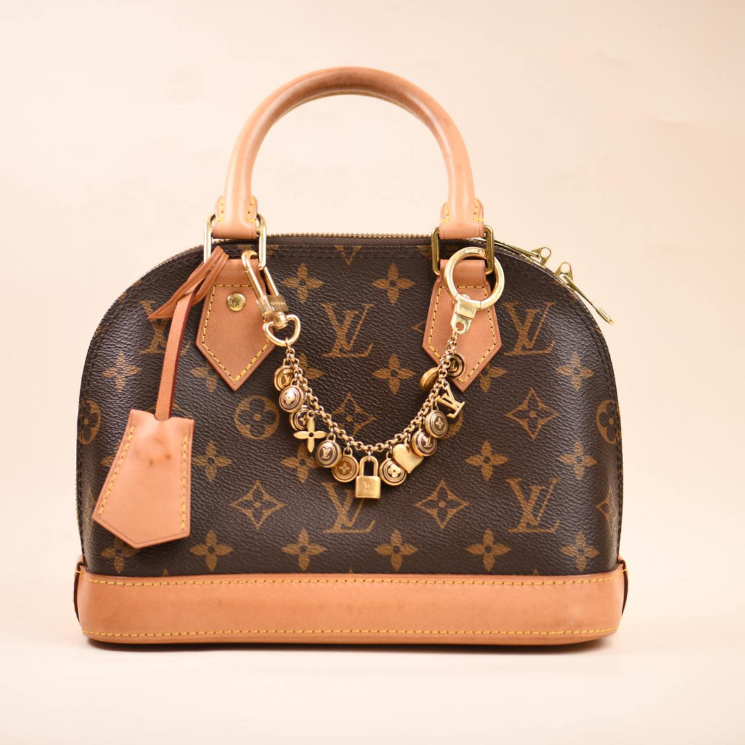 Second Hand Authentic Louis Vuitton Porte-Clés Chaine Pastilles Bag Charm