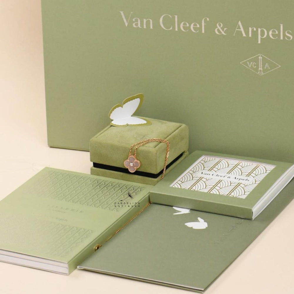 Van Cleef 2025 holiday pendant pink mother of pearl