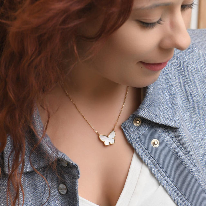 van cleef lucky butterfly mother of pearl pendant