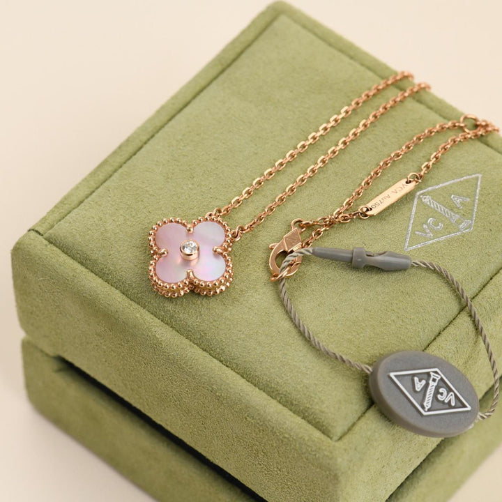 Van Cleef 2025 holiday pendant pink mother of pearl