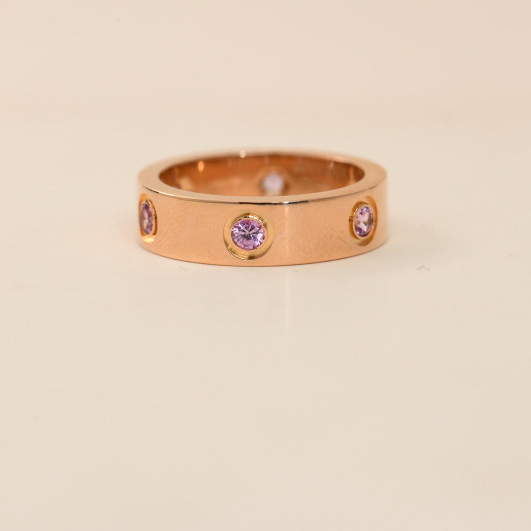 preowned cartier love ring with pink sapphire