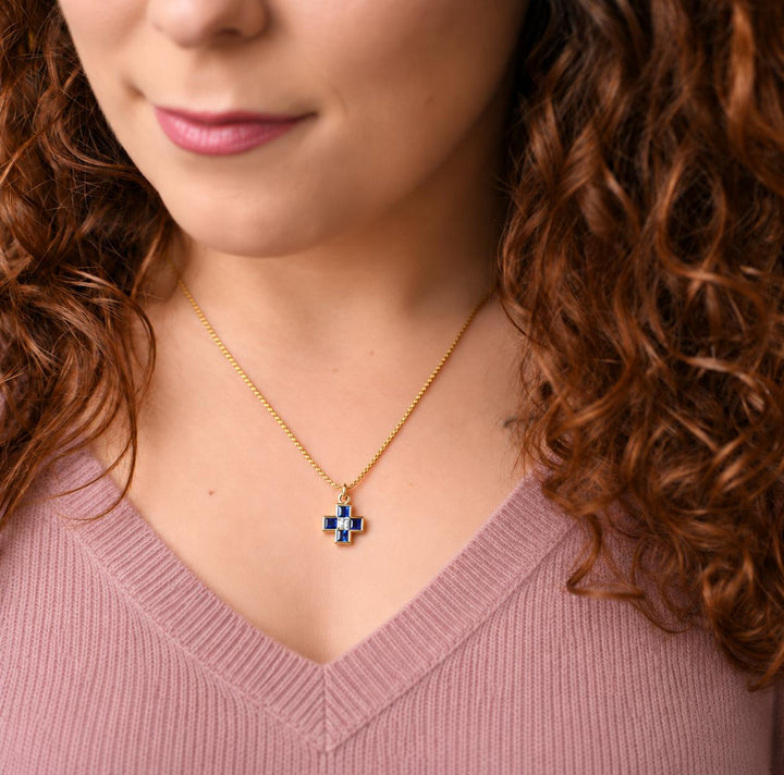 bvlgari cross pendant necklace modelling photo