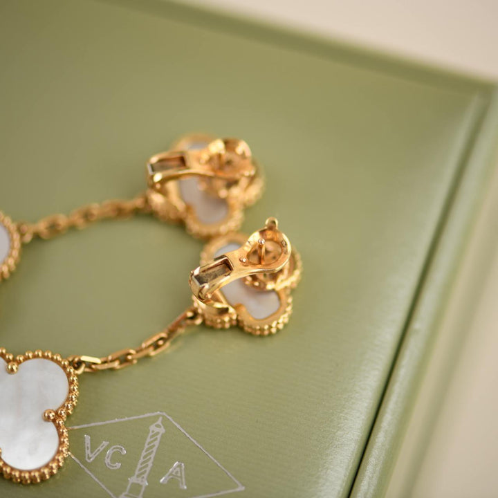 Preowned Van Cleef Magic Alhambra Two Motifs Mother of Pearl Yellow Gold Earrings