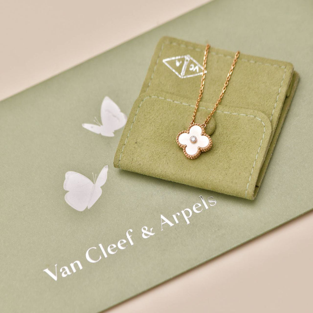 Preloved Authentic Van Cleef Alhambra 2012 Holiday Necklace Diamond Mother of Pearl