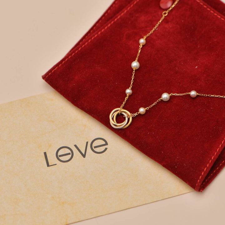 Cartier Trinity Pearl Bracelet in 18K Yellow, White & Rose Gold