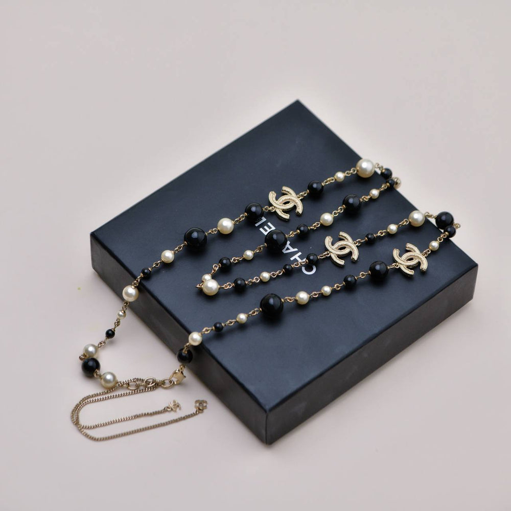 Preowned Authentic Chanel CC Faux Pearl & Black Beads Baroque Sautoir Necklace