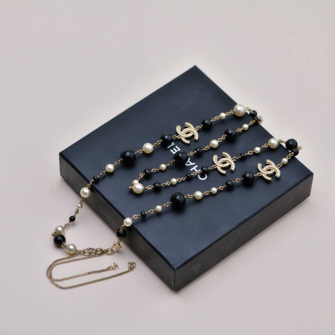 Preowned Authentic Chanel CC Faux Pearl & Black Beads Baroque Sautoir Necklace