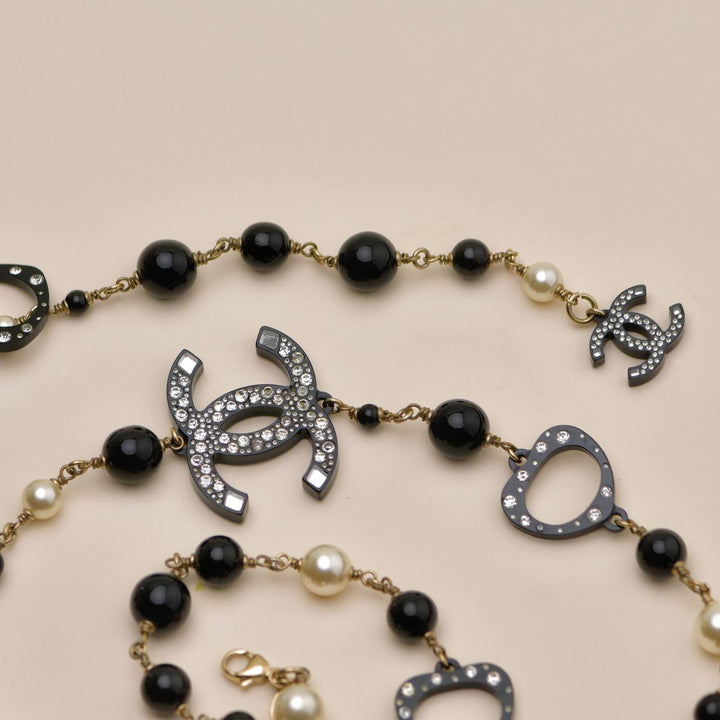 Preowned Chanel CC Faux Pearl & Crystal Black Bead Sautoir Necklace