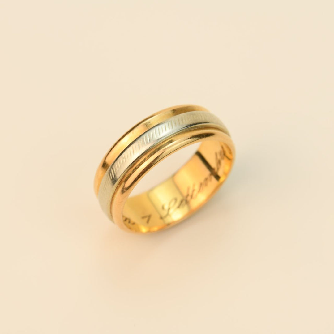 An 18ct Two Coloured Wedding Ring