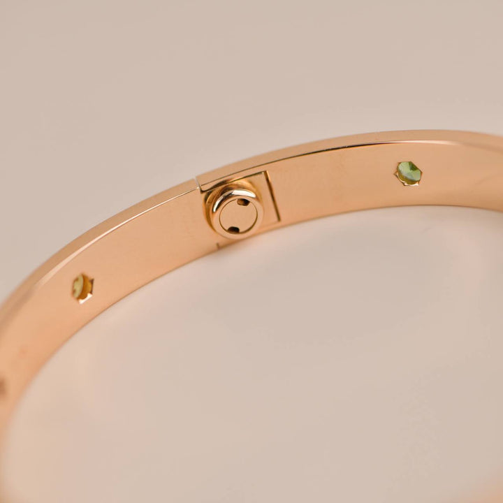 Pre-owned Cartier Love Bracelet Size 18 in Rose Gold, featuring 10 multi gemstones like pink sapphires, yellow sapphires, green garnets, orange garnets, and amethysts.