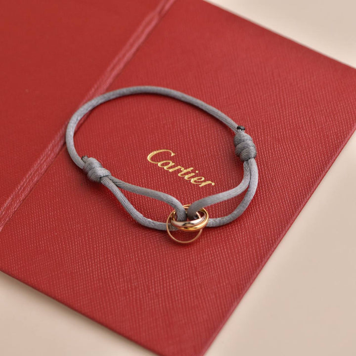 Cartier Trinity 18K Three Tone Gold Cord Adjustable Bracelet