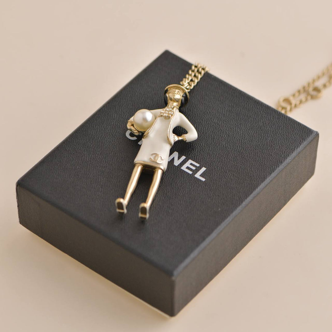 Chanel Coco Mademoiselle Figurine Enamel Gold Tone Necklace