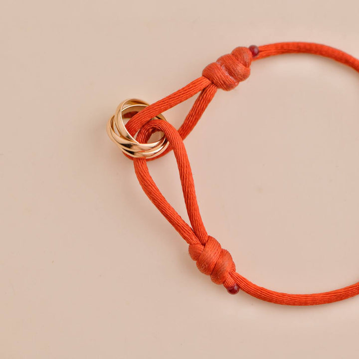 Second Hand Cartier Trinity 18K Rose Gold Red Cord Bracelet