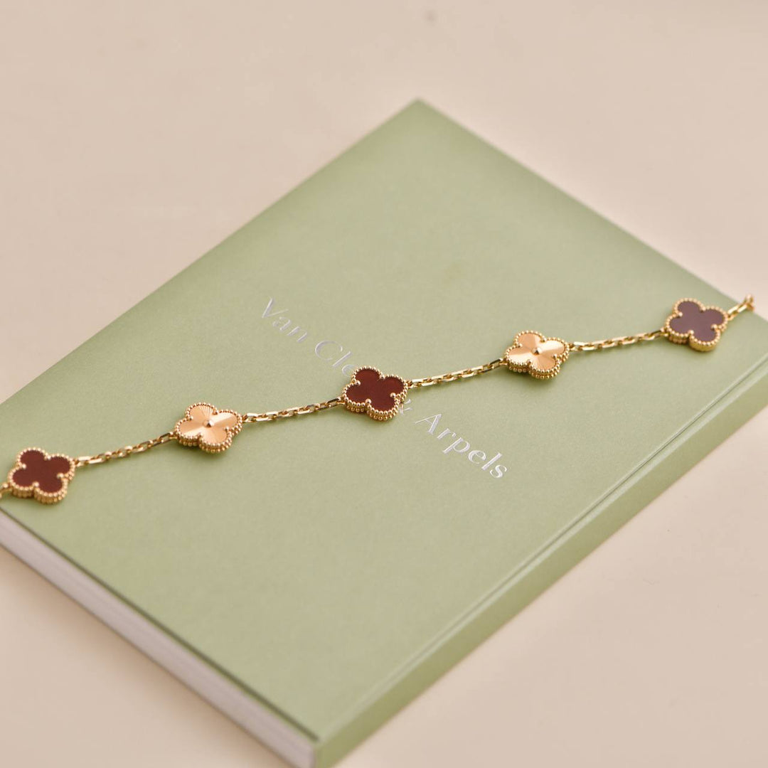 Pre-loved Van Cleef Vintage Alhambra Guilloche Carnelian Rose Gold Bracelet