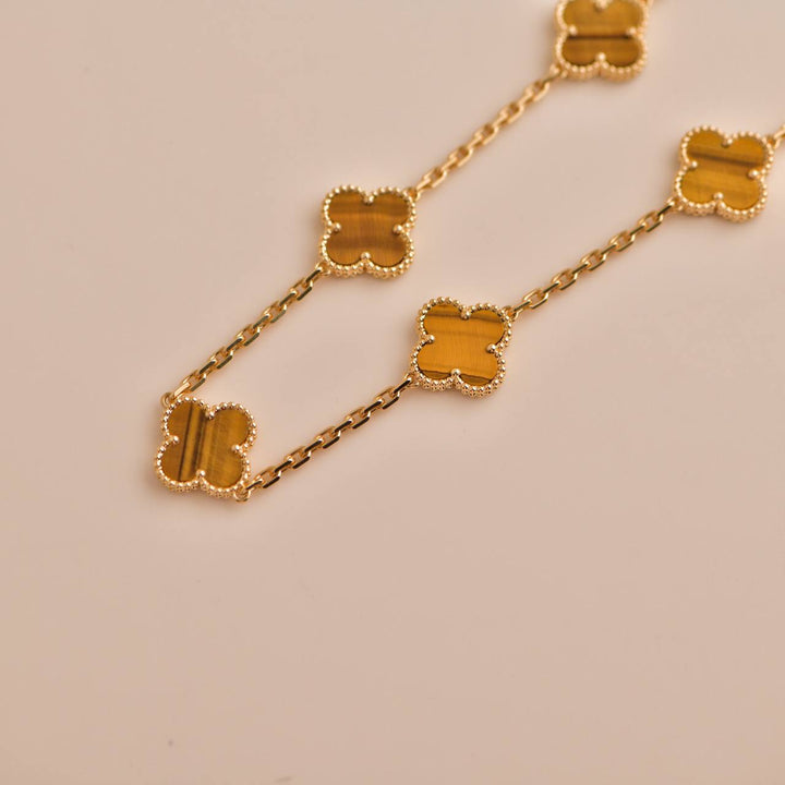 Second Hand Van Cleef Vintage Alhambra Tiger Eye Yellow Gold 20 Motifs Long Necklace