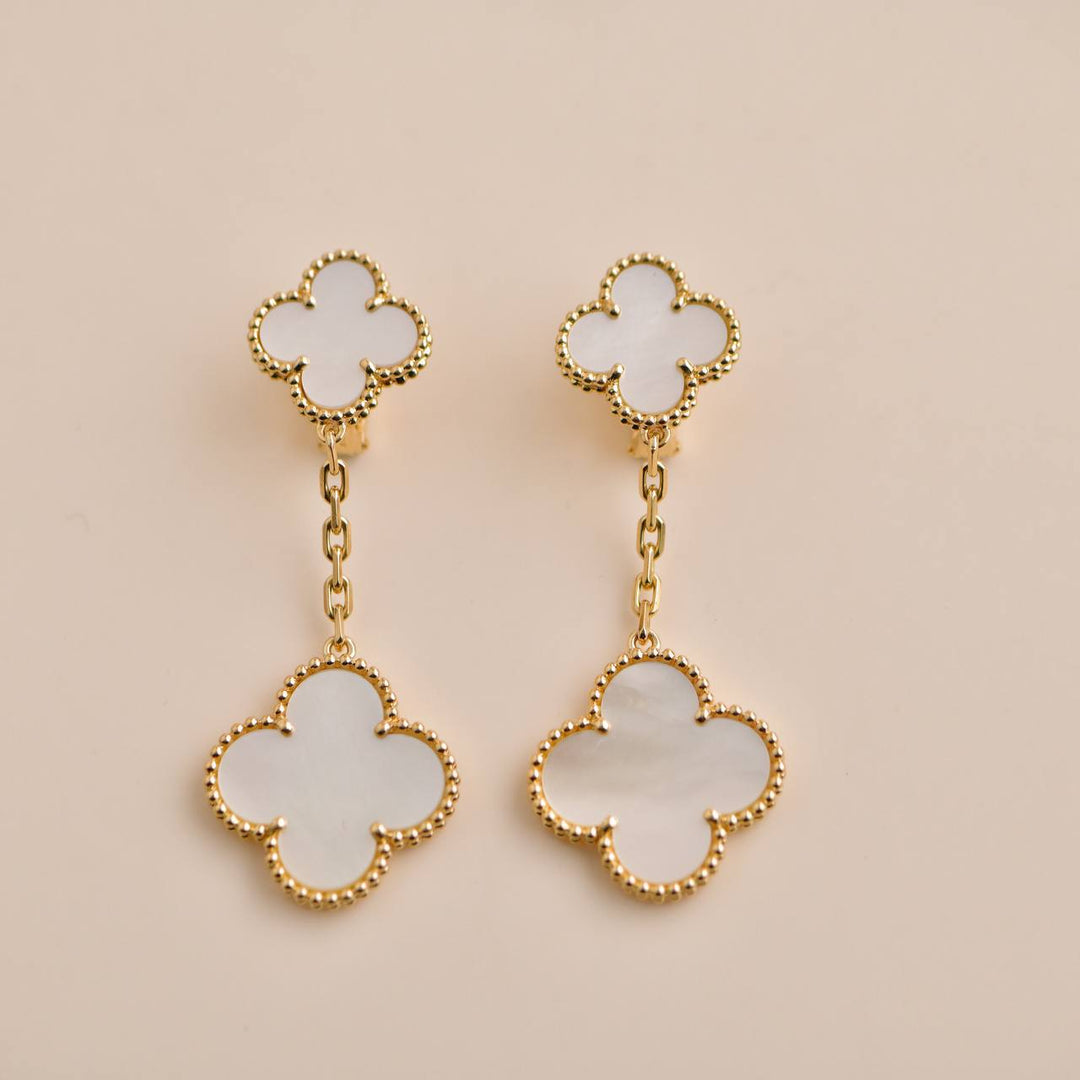 Pre-owned Van Cleef & Arpels Magic Alhambra Two Motifs Mother of Pearl Yellow Gold Earrings, featuring mother of pearl motifs