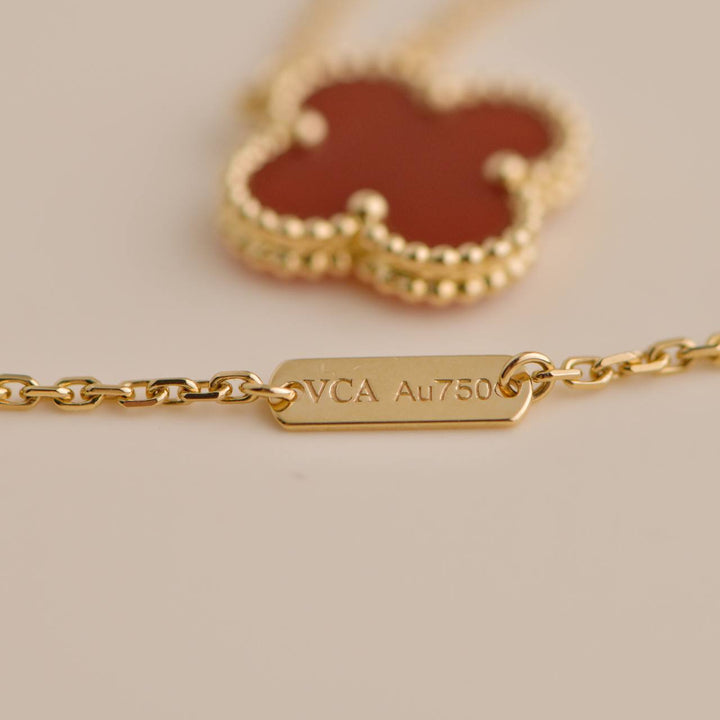 Pre-loved Van Cleef & Arpels Vintage Alhambra Carnelian Pendant Necklace, perfect for any occasion.