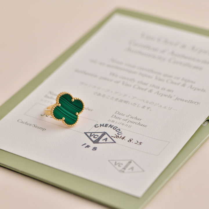 Pre-loved Van Cleef Magic Alhambra Malachite 18K Yellow Gold Ring Size 52