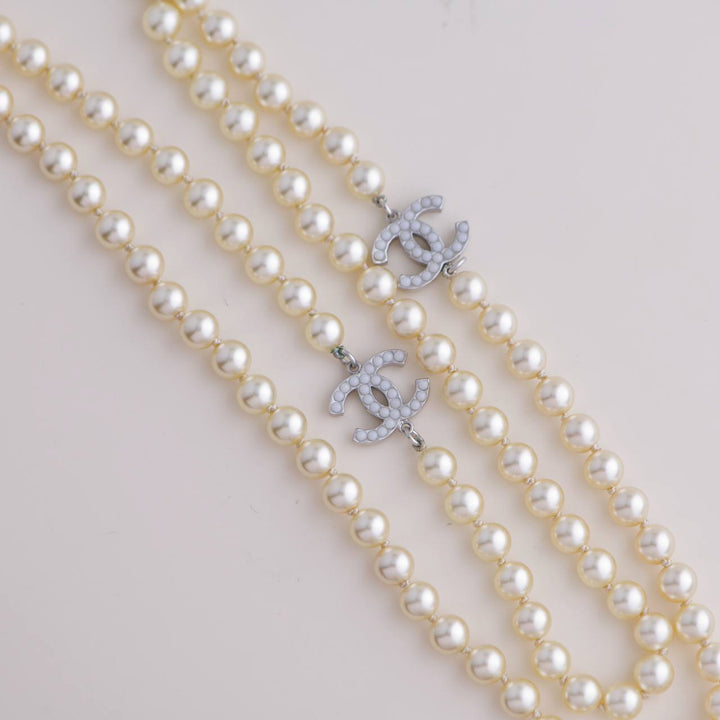 Pre-loved Chanel Three CC Logo Faux Pearl Sautoir Necklace