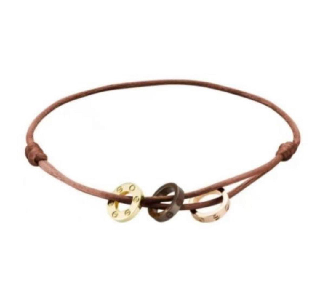 Pre-loved Cartier Love Charity Diamond Brown Ceramic Gold 3 Hoops Brown Silk Cord Bracelet