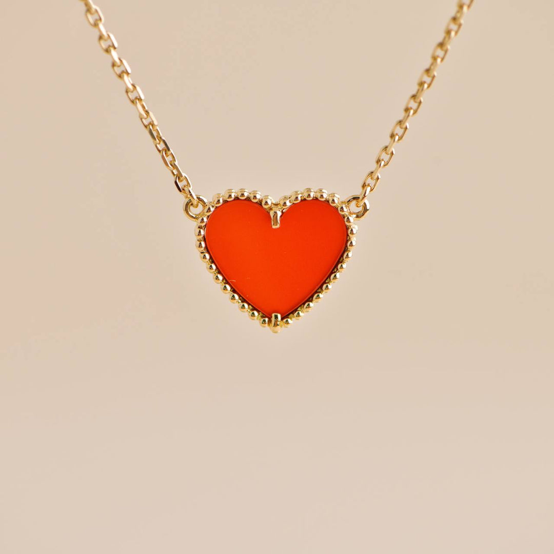 Second Hand Van Cleef & Arpels Lucky Alhambra Carnelian 18K Yellow Gold Heart Pendant Necklace